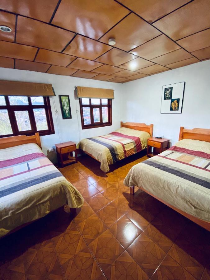 Хостел Hostal Casa Del Rio Куэнка Экстерьер фото