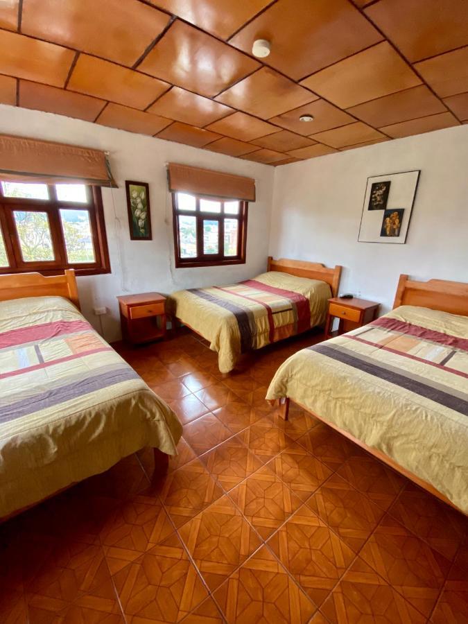 Хостел Hostal Casa Del Rio Куэнка Экстерьер фото